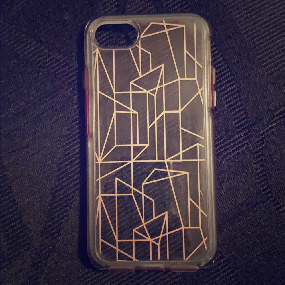Clear with gold Otterbox symmetry case iPhone 7